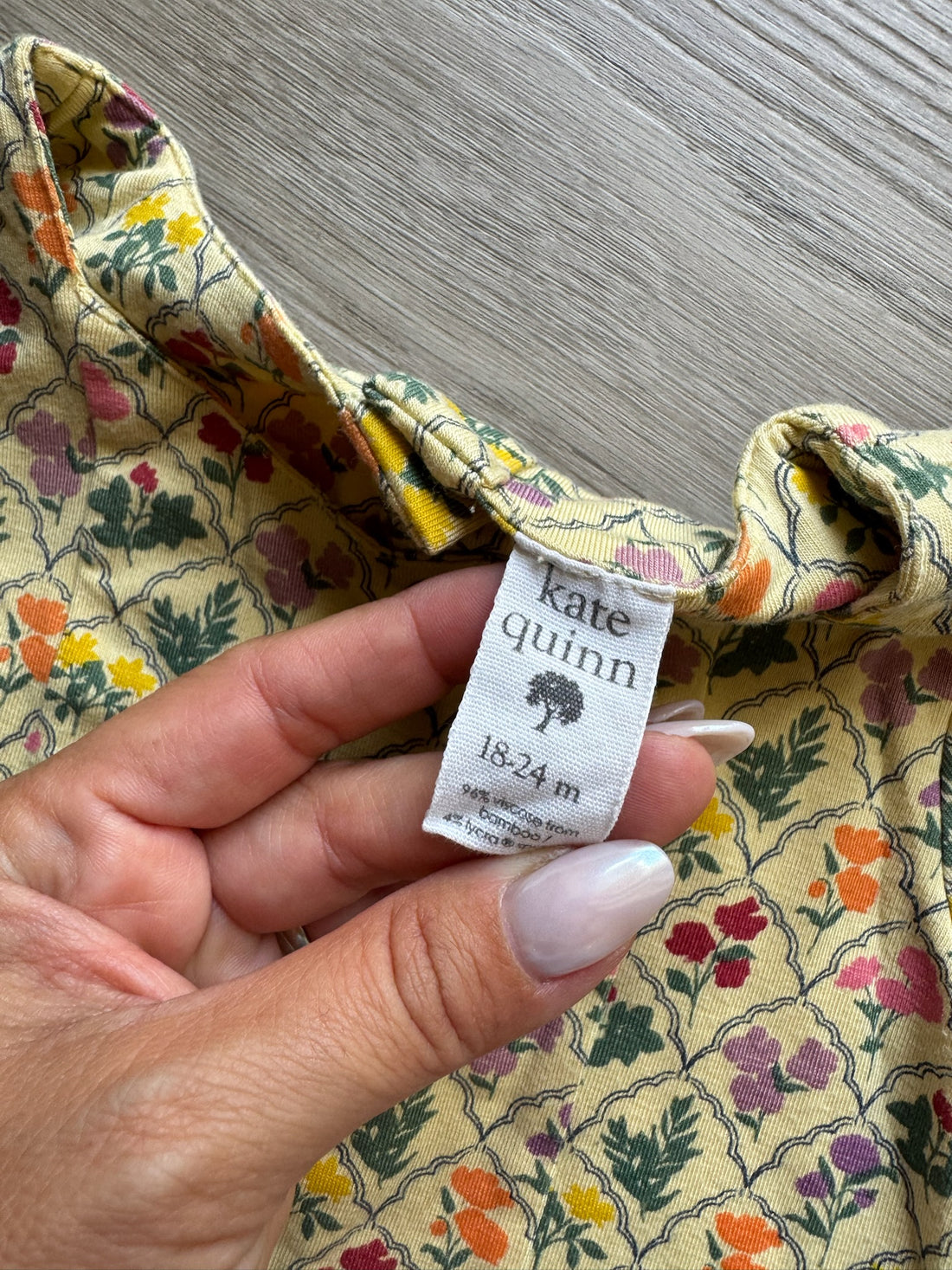 Kate Quinn Floral Onesie