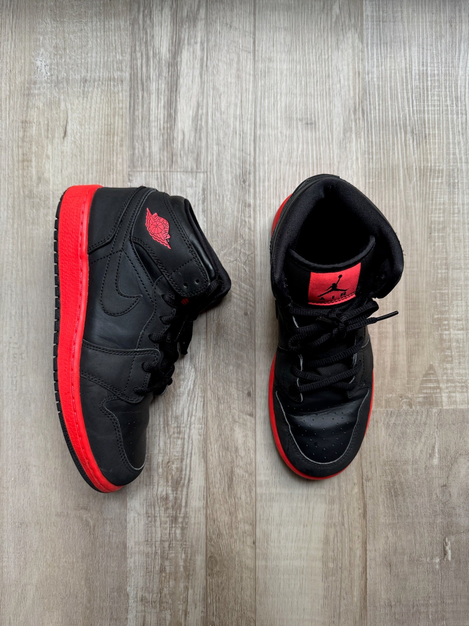 Nike Black w/ Red Jordans