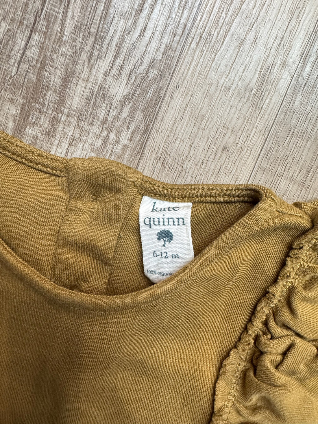 Kate Quinn Brown Top