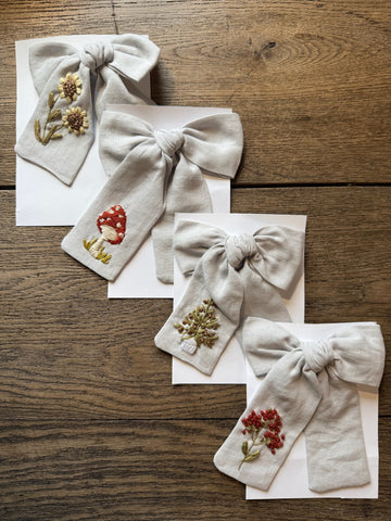 Carolina’s Handmade Light Grey Embroidered Bow
